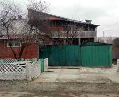 Продам дом на два выхода на Немышле  в жилом состоянии