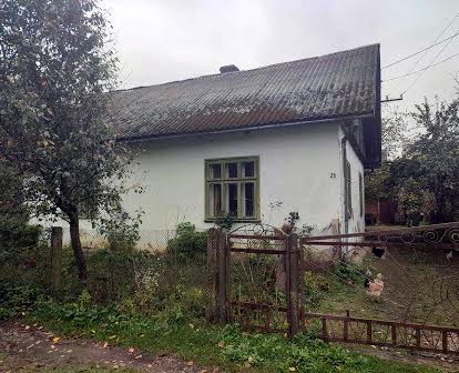 Земельна ділянка зі старим будинком на території
