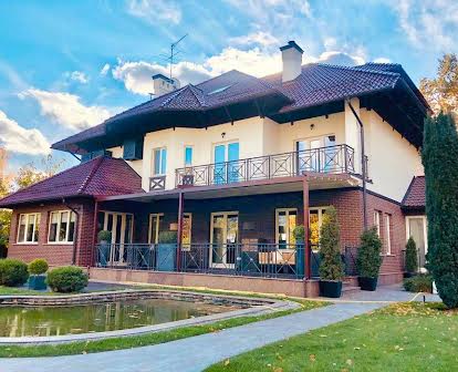 Продаж будинку 700 кв.м. з басейном, гост. буд., BBQ зоною в Романкові