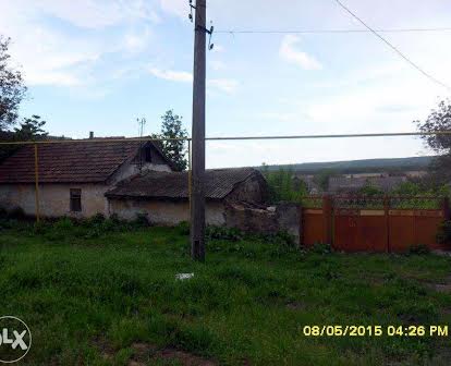 Продам участок с домом под реконструкцію  в г.Березовка
