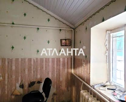 Небольшой дом на участке 25 соток в центре Августовки. Межлиманье