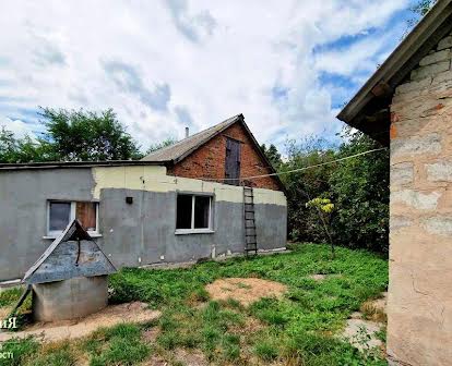 Продам кирпичный дом со свежим ремонтом в Кривошеинцах.