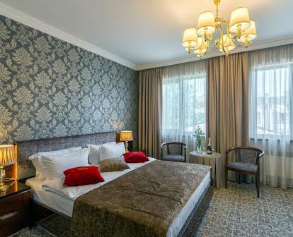 Улучшенный номер с большой двуспальной кроватью в Бутик-отеле Де Волан