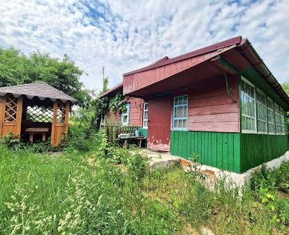 Будинок біля річки Снов в селі Макишин