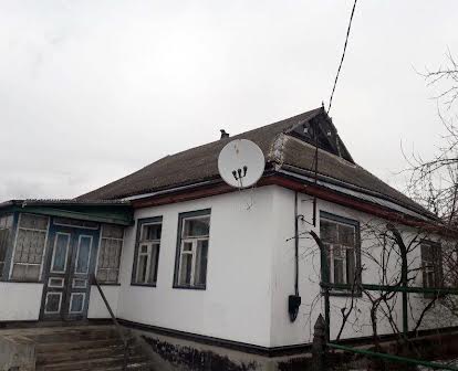 Продам 1.25га землі з будинком 124м2 с.Ходорків, вул. Піщана